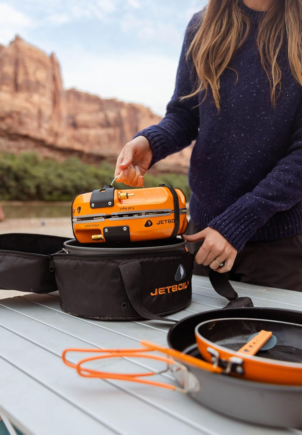 Backpack camping cooking equipment system, including camping cookware, suitable for backpacking and camping use.